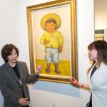 Mary-Anne Martin talks over a Diego Rivera with Ximena Ojeda