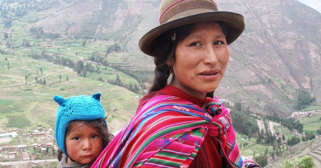 Indigenous woman and child in Sacred Valley, Peru. Courtesy quinet.