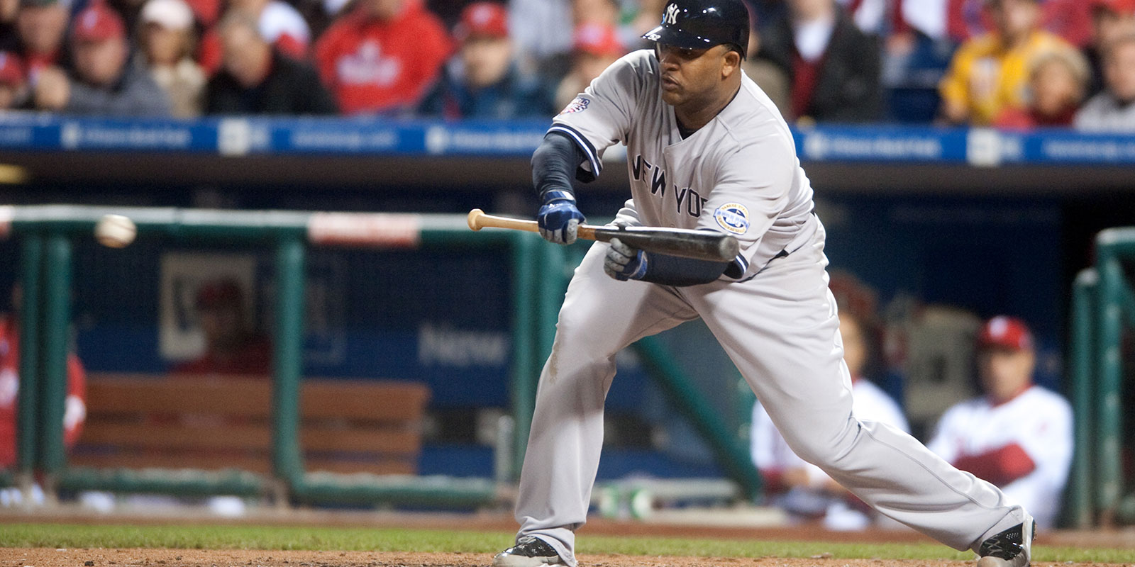 Former NY Yankee CC Sabathia bunts (Scott Anderson/Dreamstime)