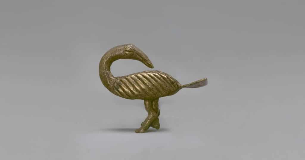 A Sankofa gold weight made of brass in Akan Ghana (Brooklyn Museum)