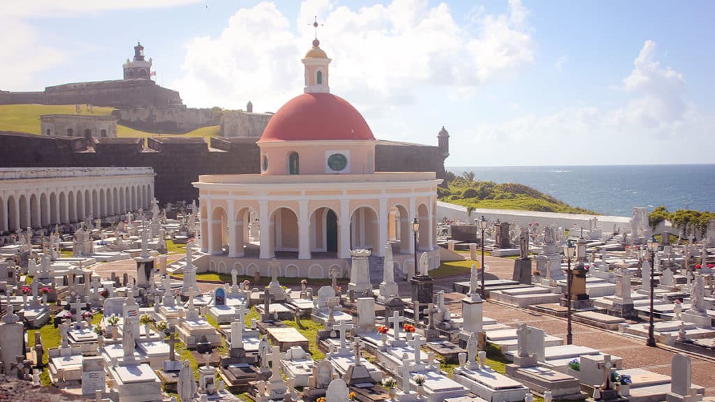 Yewá in pink watches over the Old San Juan cemetery (Ajitha/Adobe)