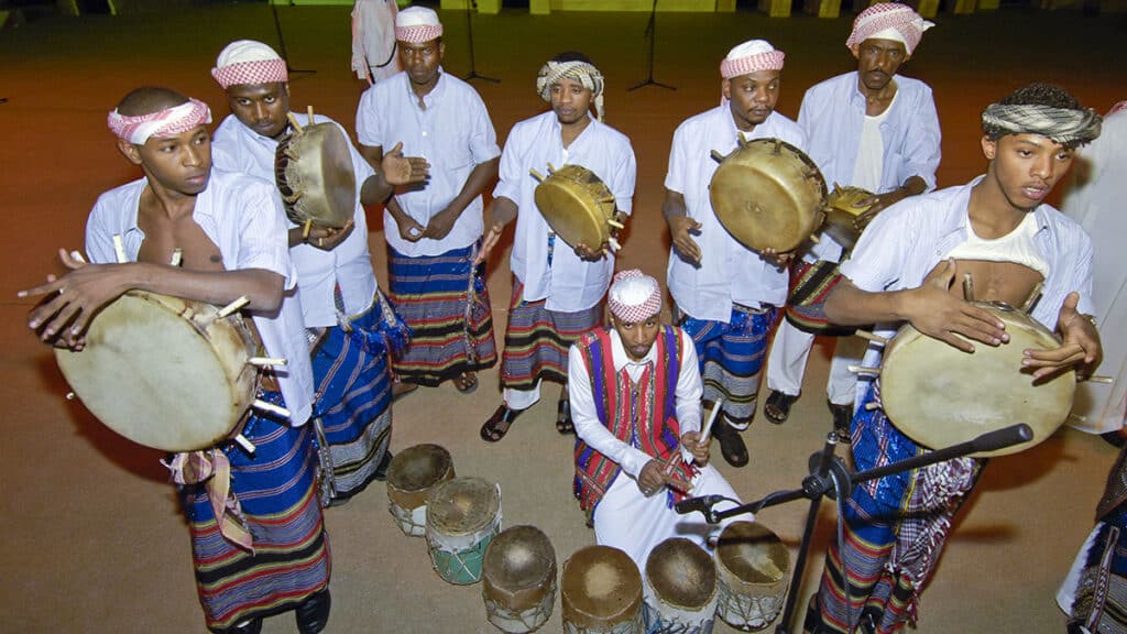Arab pandereta in the hands of a Saudi folk group (Al Masmak/Dreamstime)
